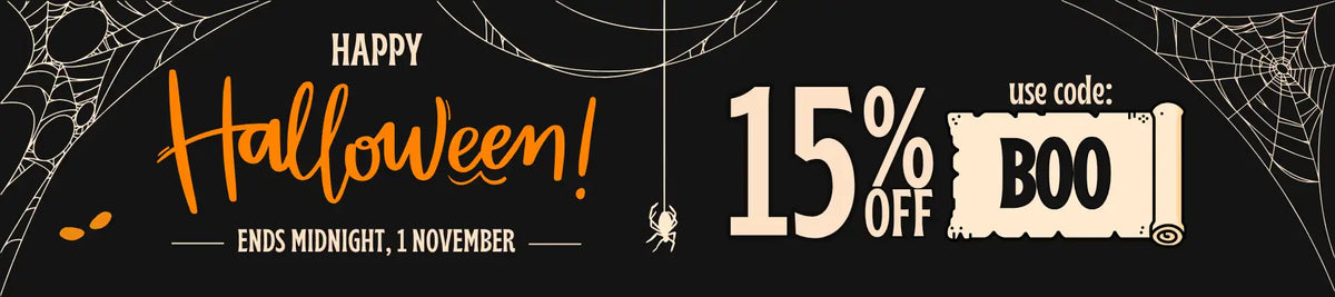 Black halloween-themed promotional banner with orange and cream text advertising a 15% discount using the code boo.