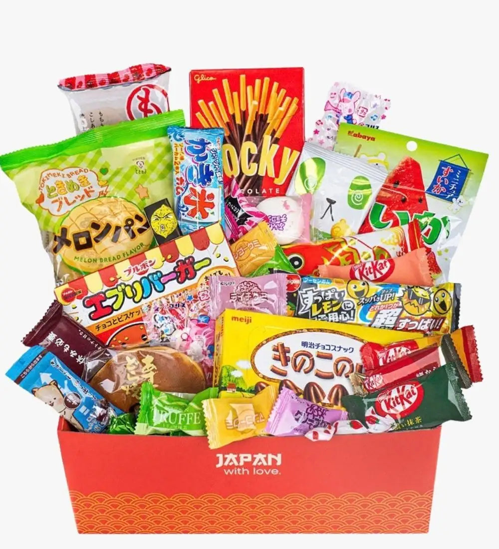 Red gift basket filled with colorful japanese snacks and candies.