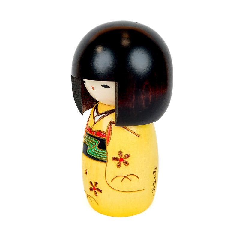 Yellow Kokeshi doll