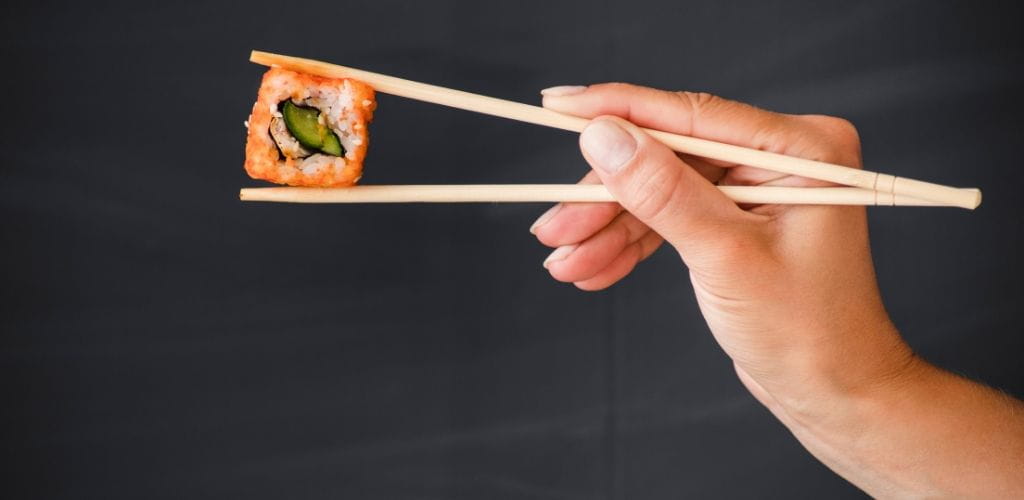 hold Japanese chopsticks
