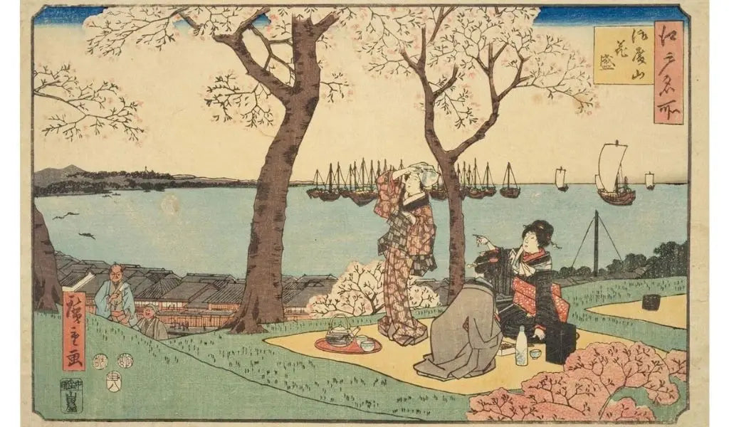 Hiroshige print representing a picnic under cherry blossoms